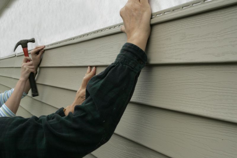 Vinyl siding repair installation